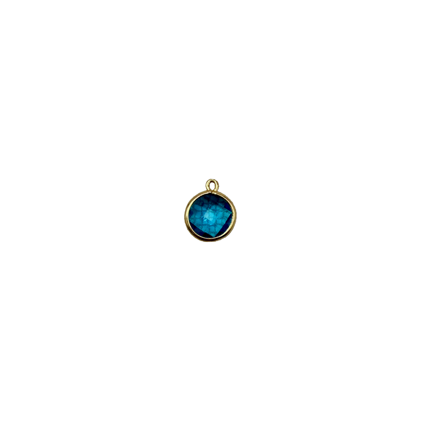Faceted ocean-blue round gem in polished gold
