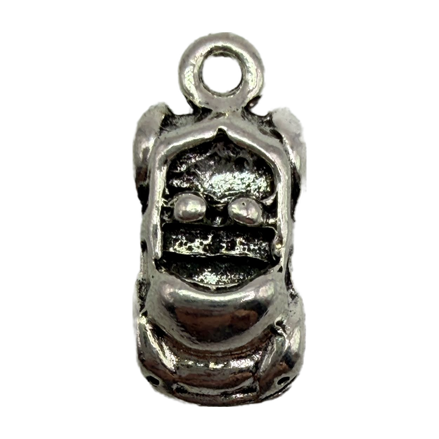 Oxidized silver-tone gorilla face charm with carved eyes and dark recessed detailing