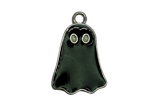 Glossy black ghost figure with silver outline and wide eyes
