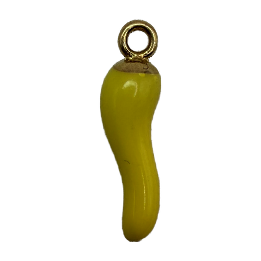 Glossy yellow chili pepper charm with polished gold accent on black background