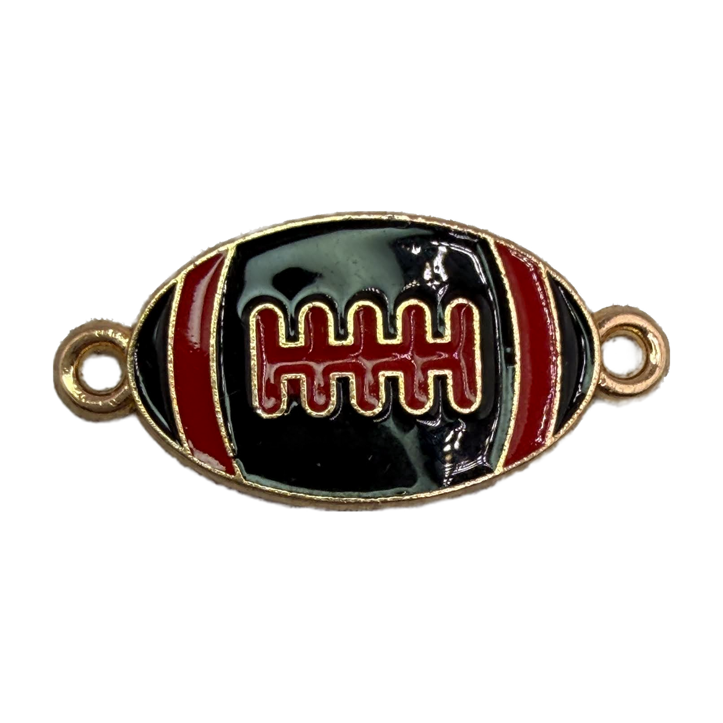 Black enamel football with red stripes and gold detailing