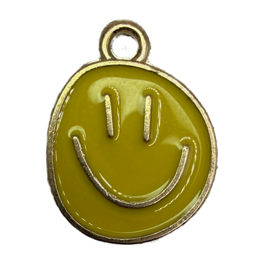 Glossy mustard-yellow smiley face disc with gold outline