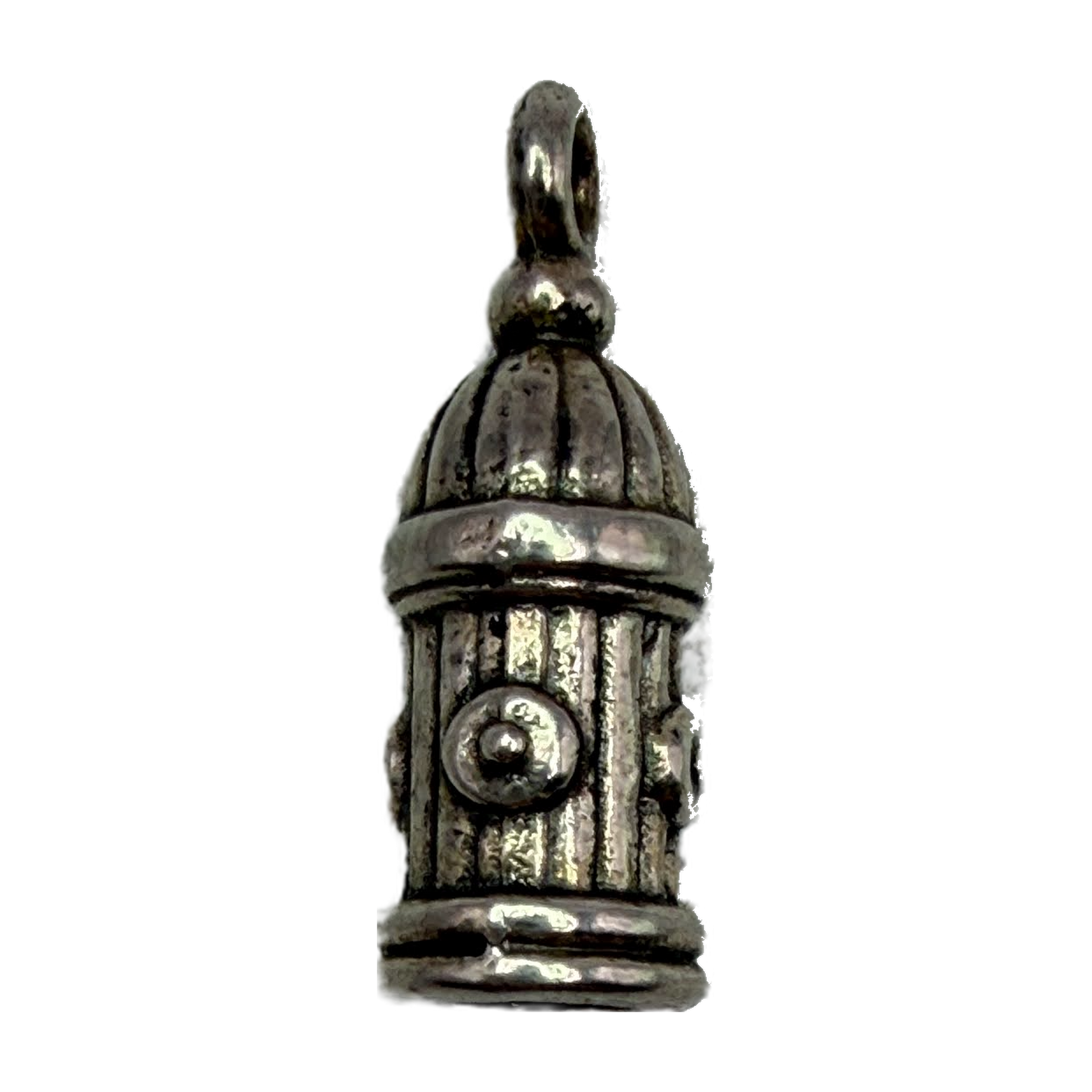 Vintage silver fire hydrant charm with oxidized patina and raised valve details on black background
