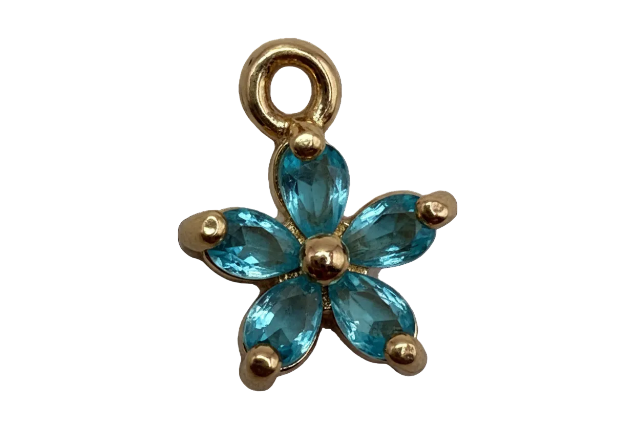 Gold flower charm with five faceted aqua blue petal gems