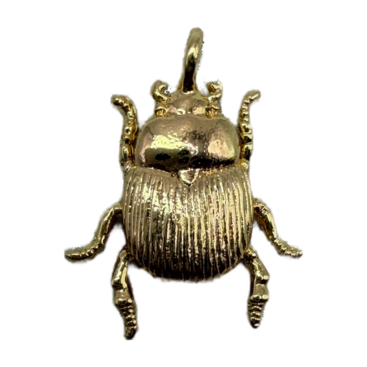 Gold scarab beetle charm with ridged wing detailing and polished finish