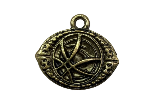 Antiqued gold pentagram medallion with engraved border and darkened recessed details