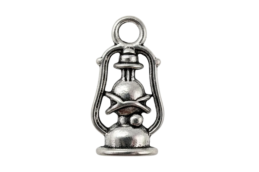 Antique silver lantern charm with detailed frame and burner silhouette