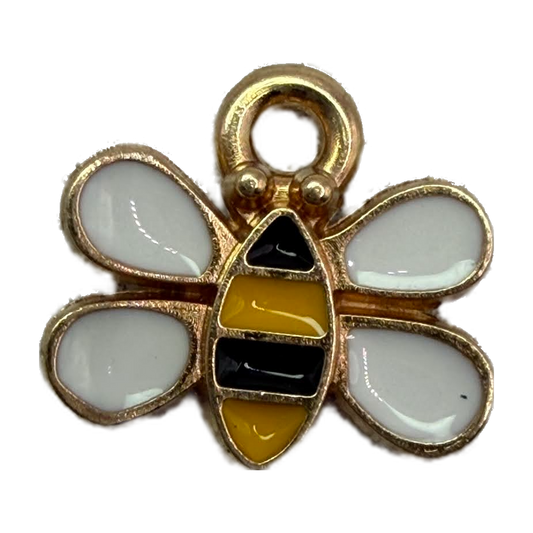 Gold bee charm with white enamel wings and black and yellow striped body