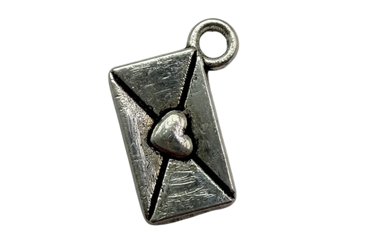 Silver-tone textured envelope charm with raised heart seal and distressed finish