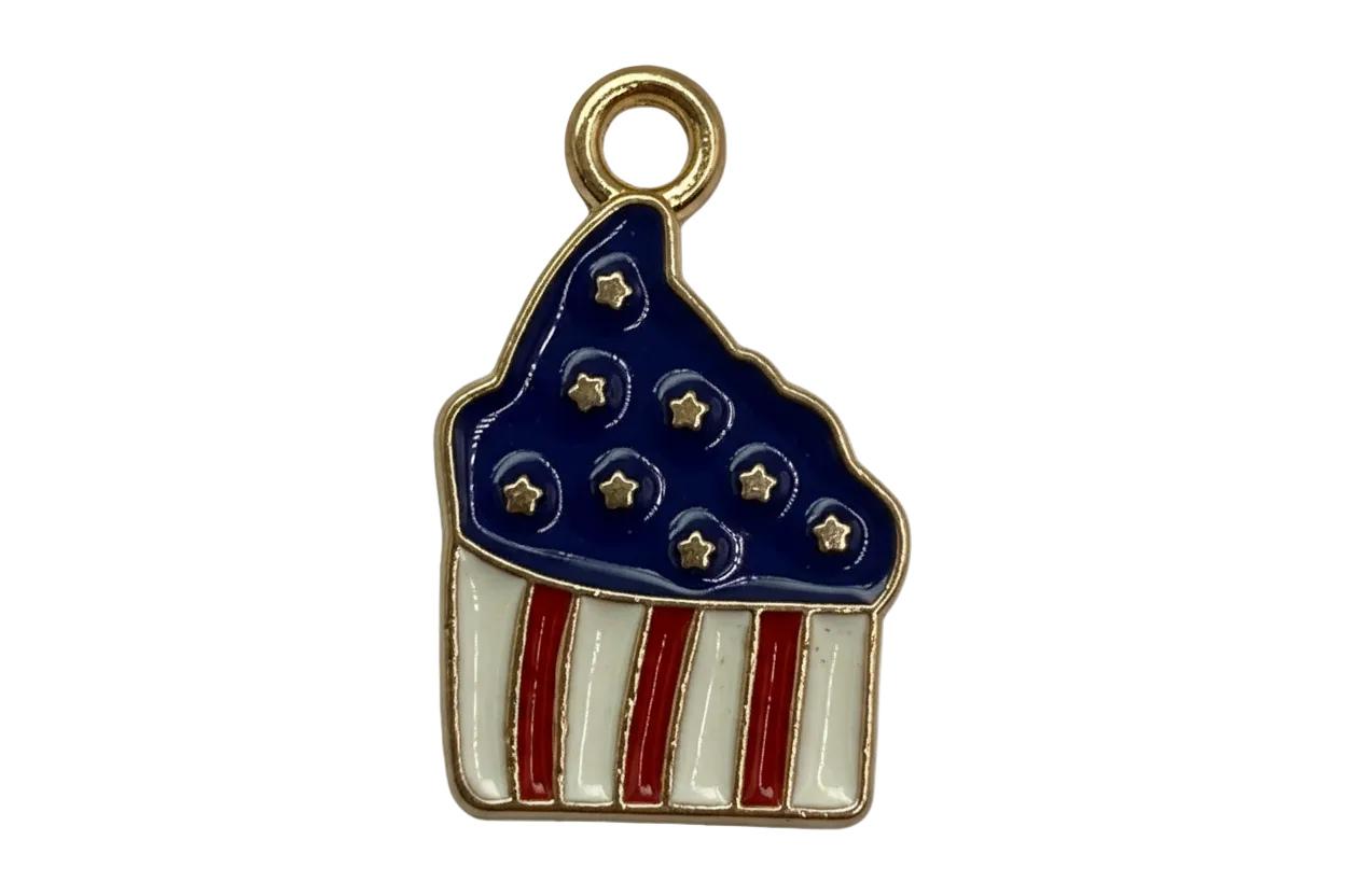 Gold-tone cupcake charm with navy frosting, star details, and red-and-white striped base