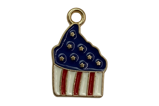 Gold-tone cupcake charm with navy frosting, star details, and red-and-white striped base