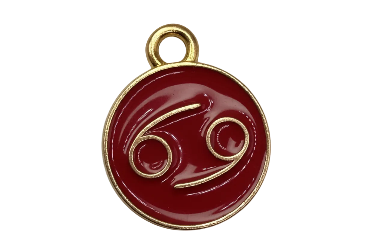 Crimson enamel Cancer zodiac medallion with raised gold symbol
