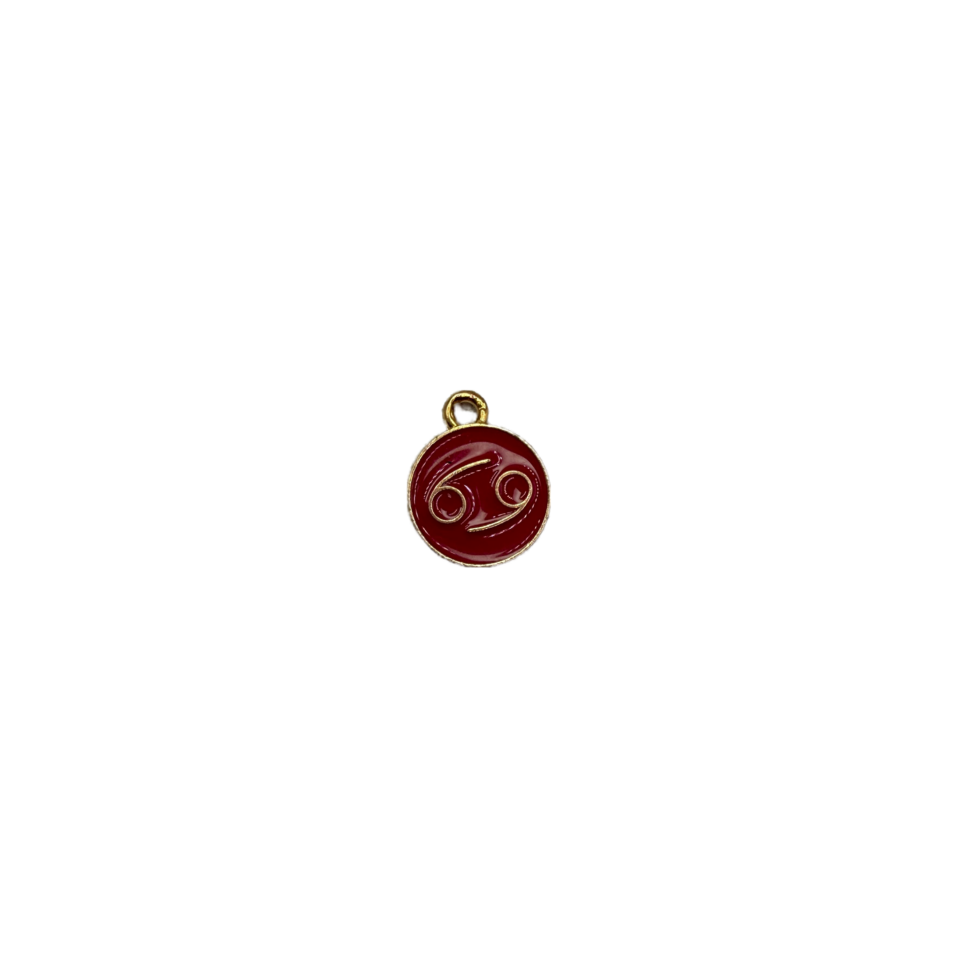 Crimson Cancer zodiac medallion in gold detail