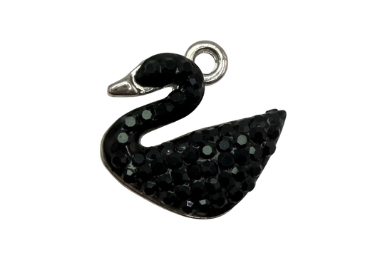Silver-tone swan silhouette covered in black pavé crystals