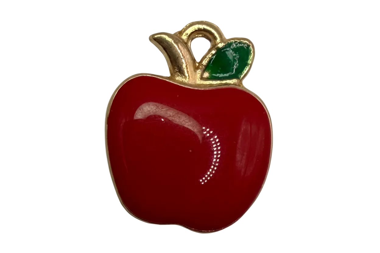 Glossy red apple fruit with green leaf and gold outline on black background
