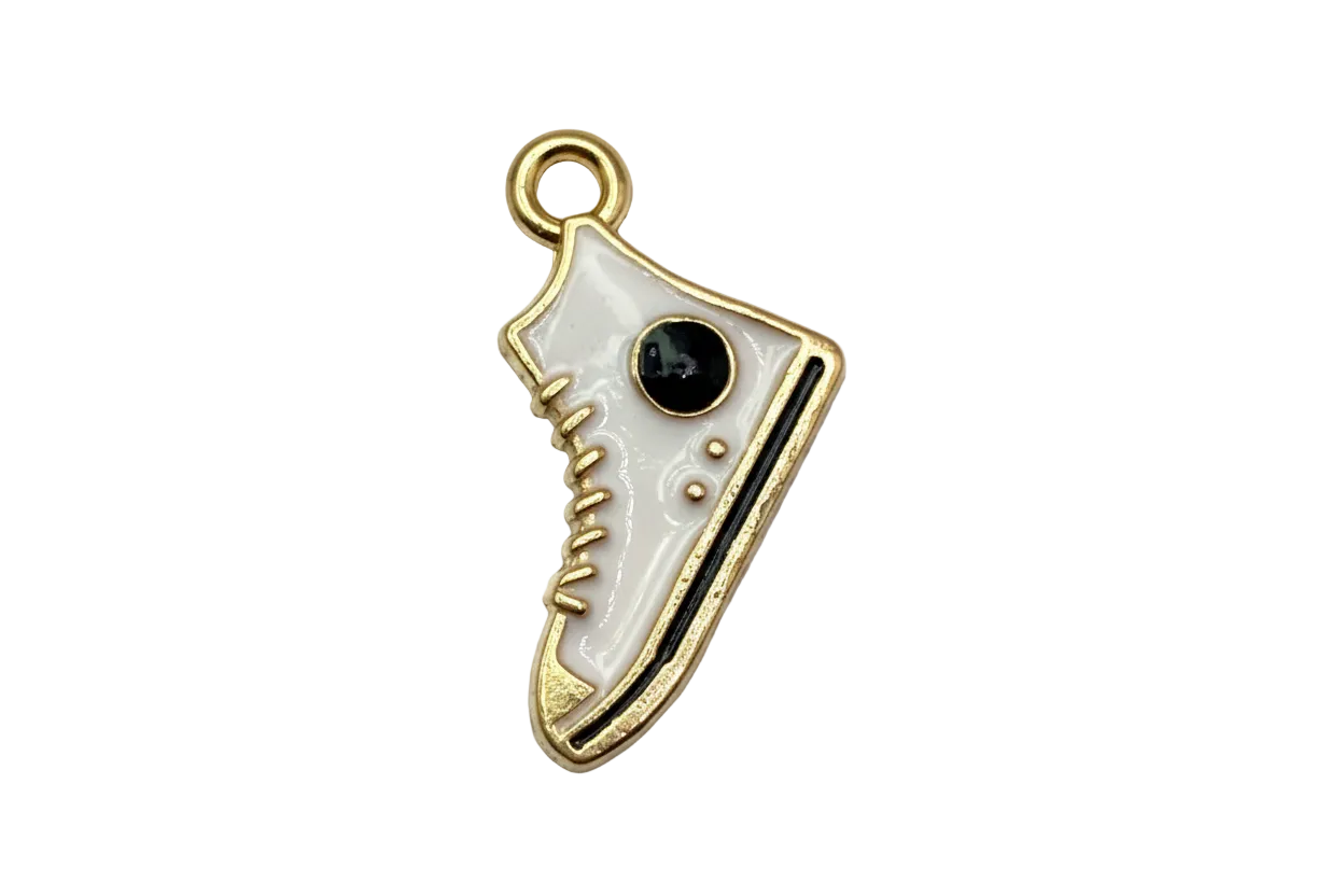 White enamel sneaker with black details and gold outline