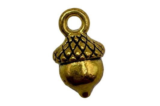 Gold acorn charm with textured cap and black crosshatch detail