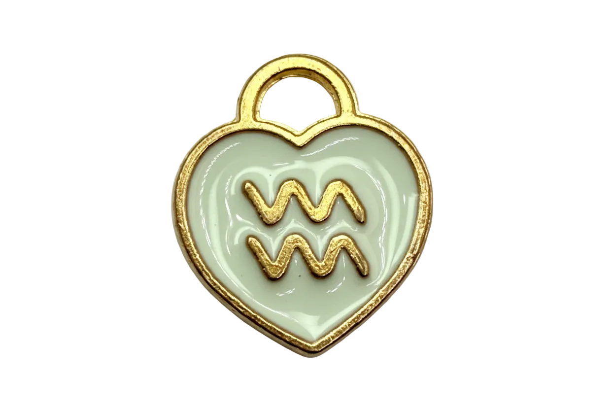 White enamel heart with gold Aquarius symbol and marbled neutral accent in gold-tone frame
