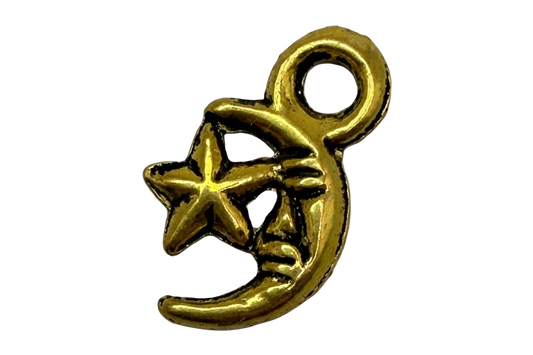 Gold crescent moon and star charm with sculpted details and antiqued shadows