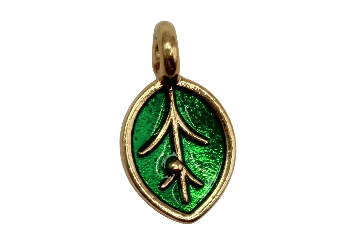 Gold-framed green enamel leaf medallion with raised vein details on black background