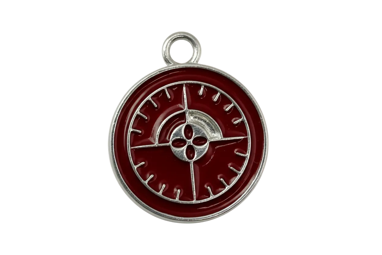 Round burgundy enamel compass medallion with silver detailing