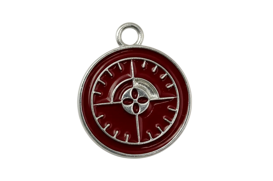 Round burgundy enamel compass medallion with silver detailing