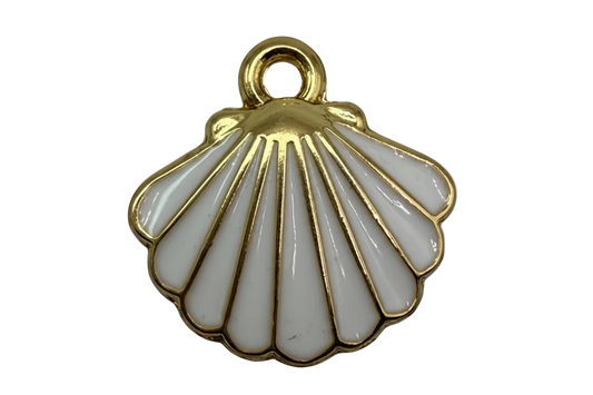 White enamel scallop seashell with gold outlines on black background