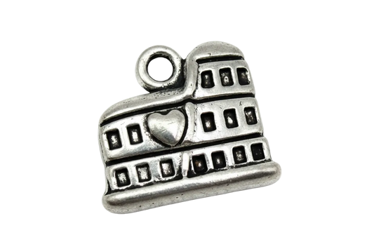 Antiqued silver building charm with raised heart detail and window cutouts