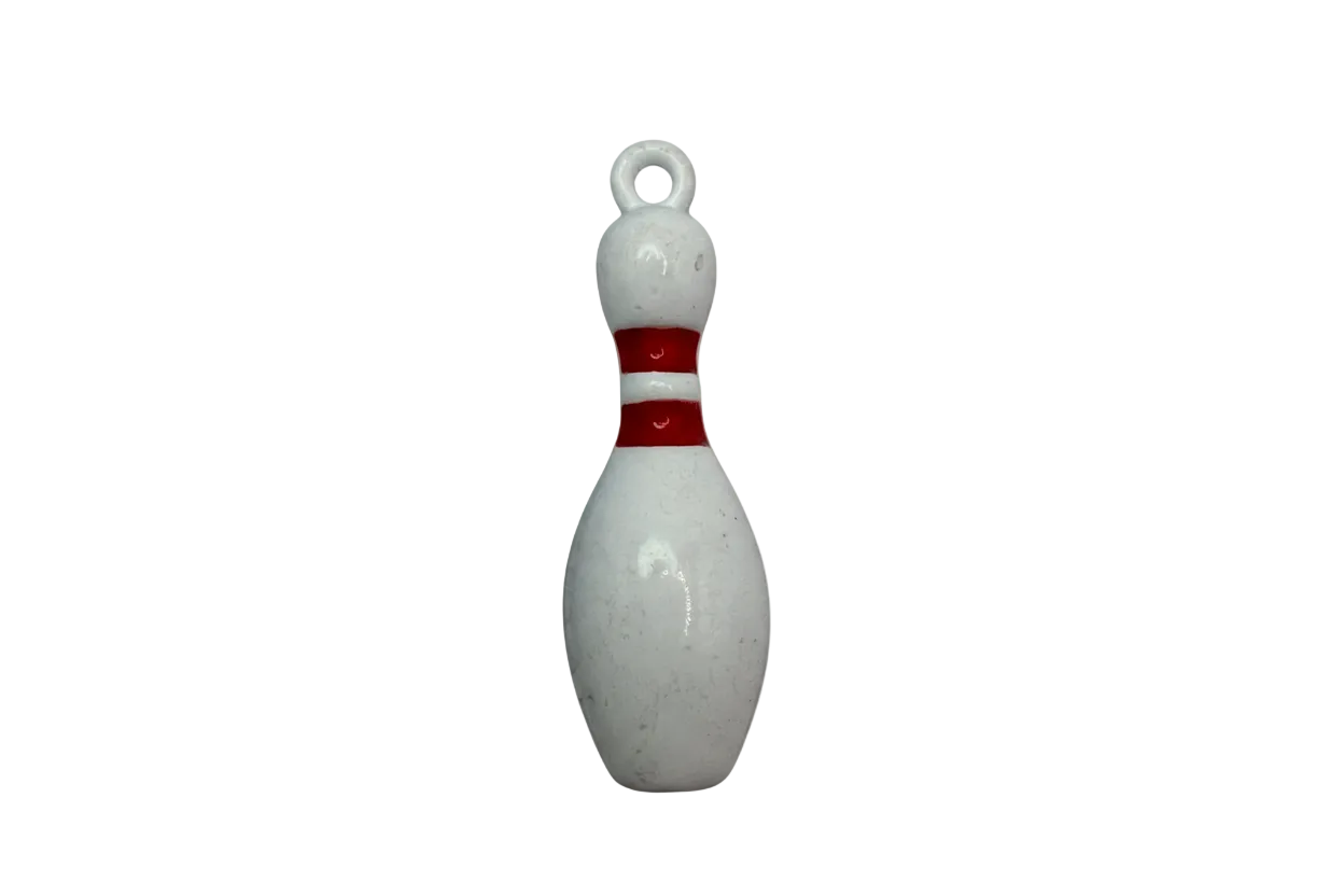 White bowling pin charm with red stripes on a black background