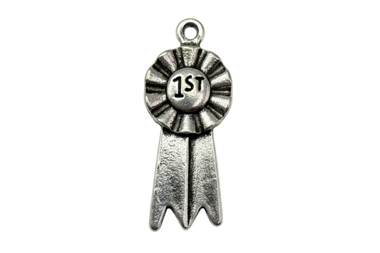 Oxidized silver first place ribbon medal with raised rosette and “1st” text