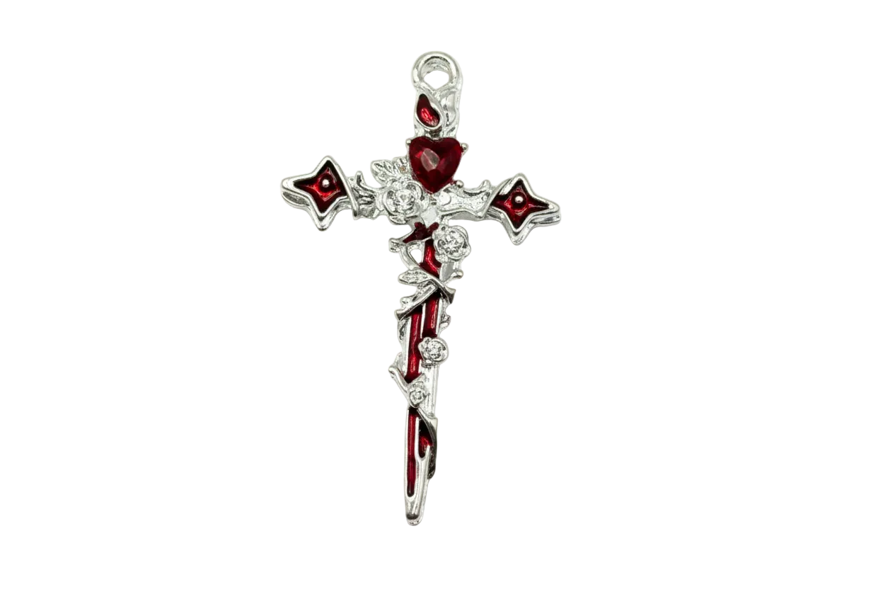 Silver ornate cross with glossy crimson inlay, heart accent, and raised rose details