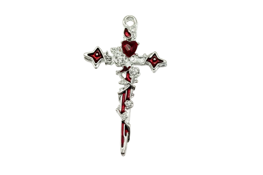 Silver ornate cross with glossy crimson inlay, heart accent, and raised rose details