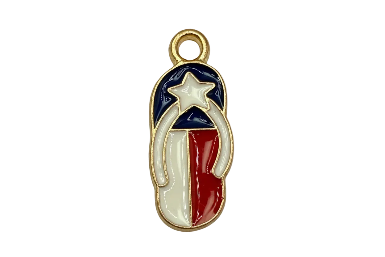 Gold outlined enamel flip-flop sandal with star, navy top, gray strap, and red and ivory color-block base