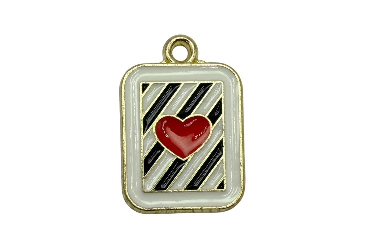 Gold framed rounded-square tile with black and gray diagonal stripes and a glossy red heart on white enamel