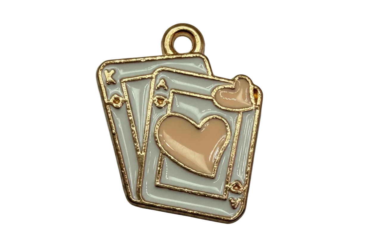 Gold-outlined enamel playing card stack with a blush heart on pale gray cards