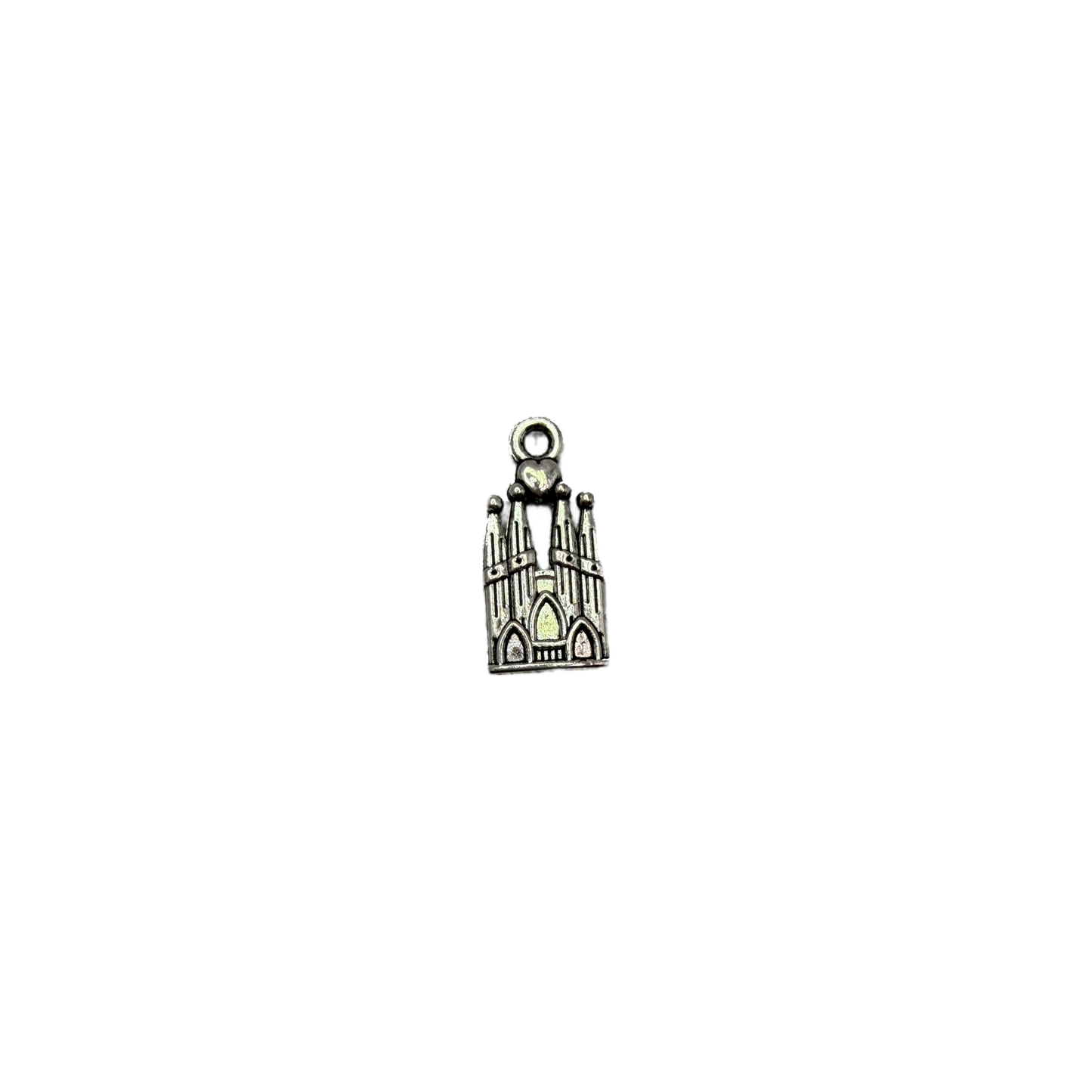 Antique silver cathedral facade with arches, spires, and heart detail