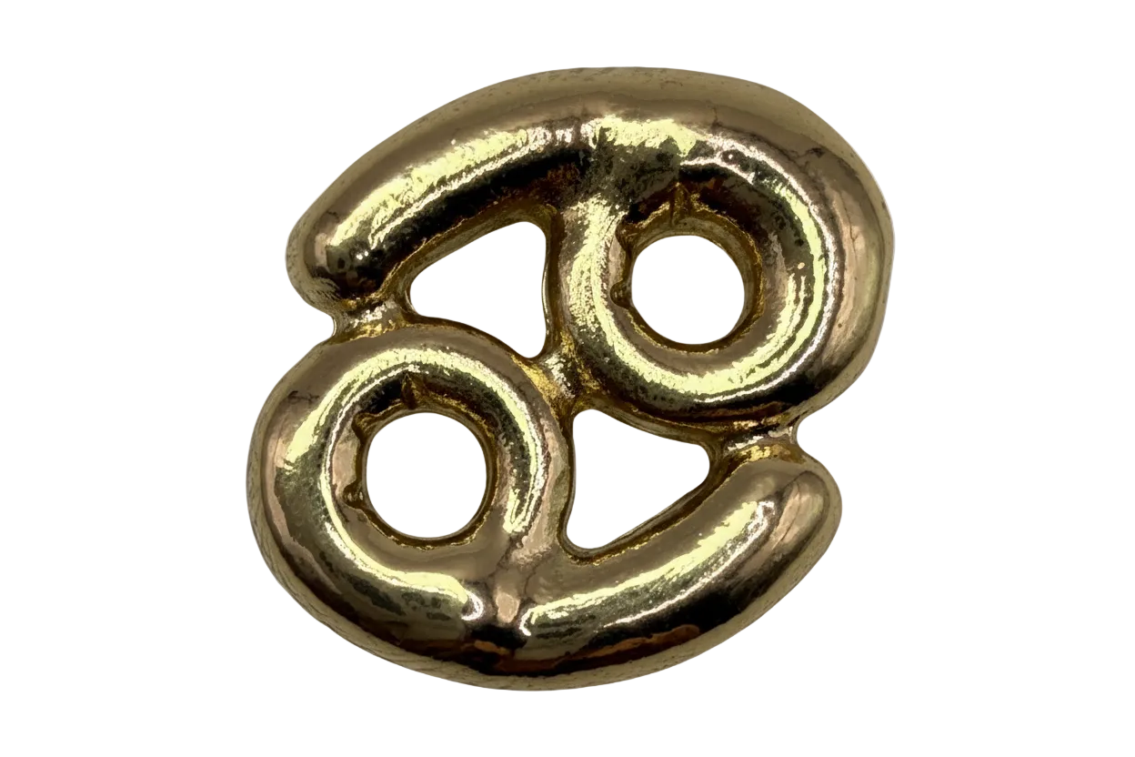 High-polish gold Cancer zodiac symbol with sculptural rounded contours