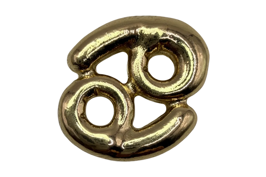 High-polish gold Cancer zodiac symbol with sculptural rounded contours