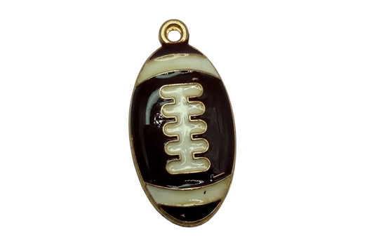 Black and ivory enamel football with gold outline and raised laces