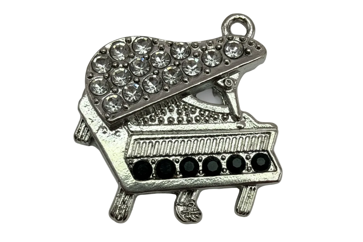 Silver grand piano with pavé clear crystals on the lid and black stone accents