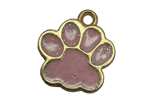 Gold-framed pink paw print with iridescent glitter enamel