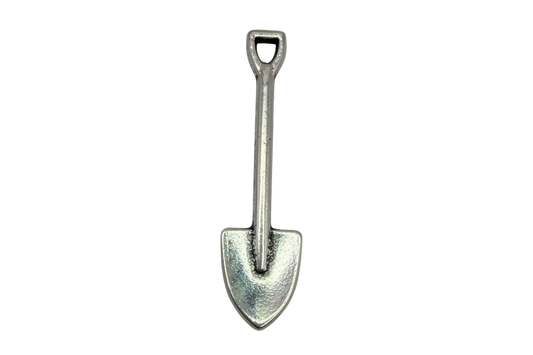 Silver-toned mini shovel pendant with polished finish on black background
