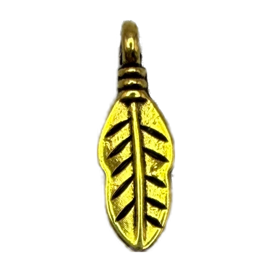 Gold leaf pendant with textured surface and dark recessed vein details