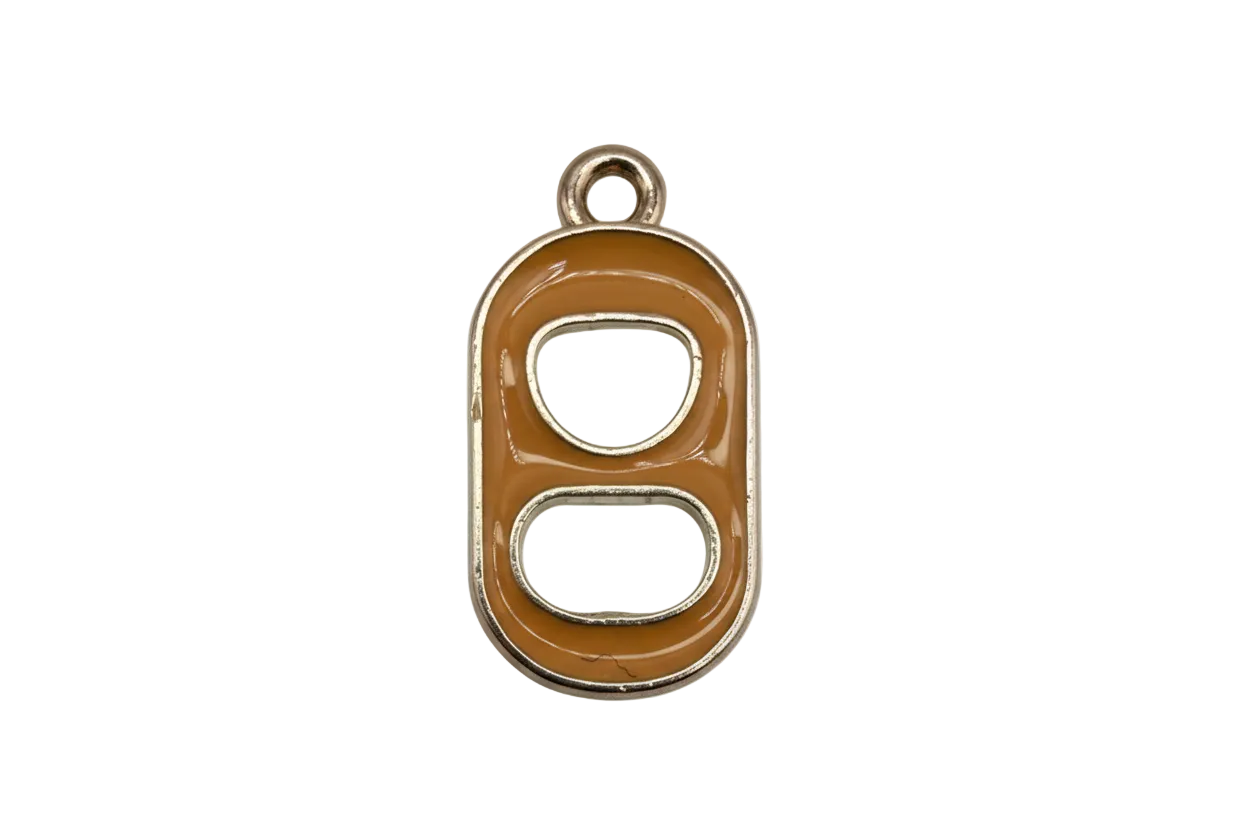 Caramel enamel can tab with gold outline and two cutout openings