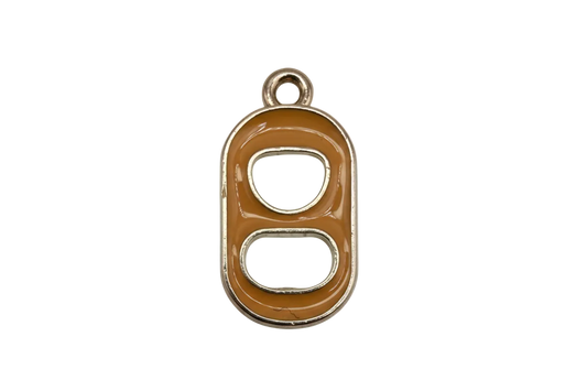 Caramel enamel can tab with gold outline and two cutout openings