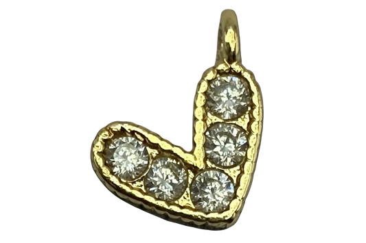 Gold letter J initial with clear pavé gems on a black background
