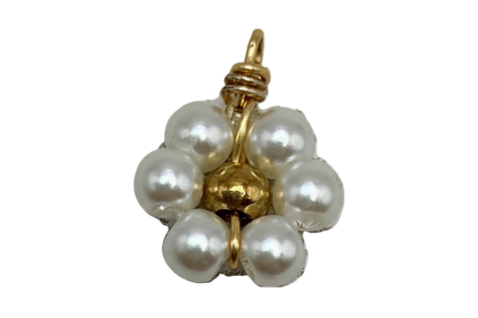 Ivory pearl cluster flower with polished gold center and knot detail