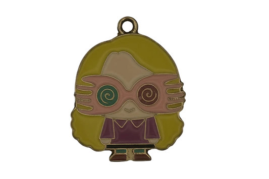 Enamel charm of a cartoon girl with spiral glasses, yellow hair, and purple clothes on a black background.