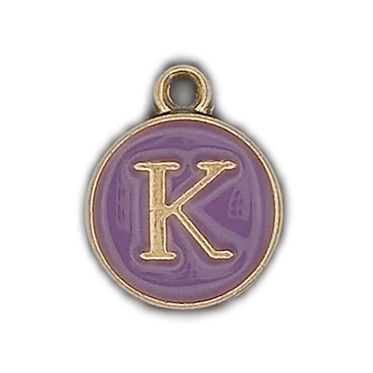 close-up of round purple enamel charm with gold letter K