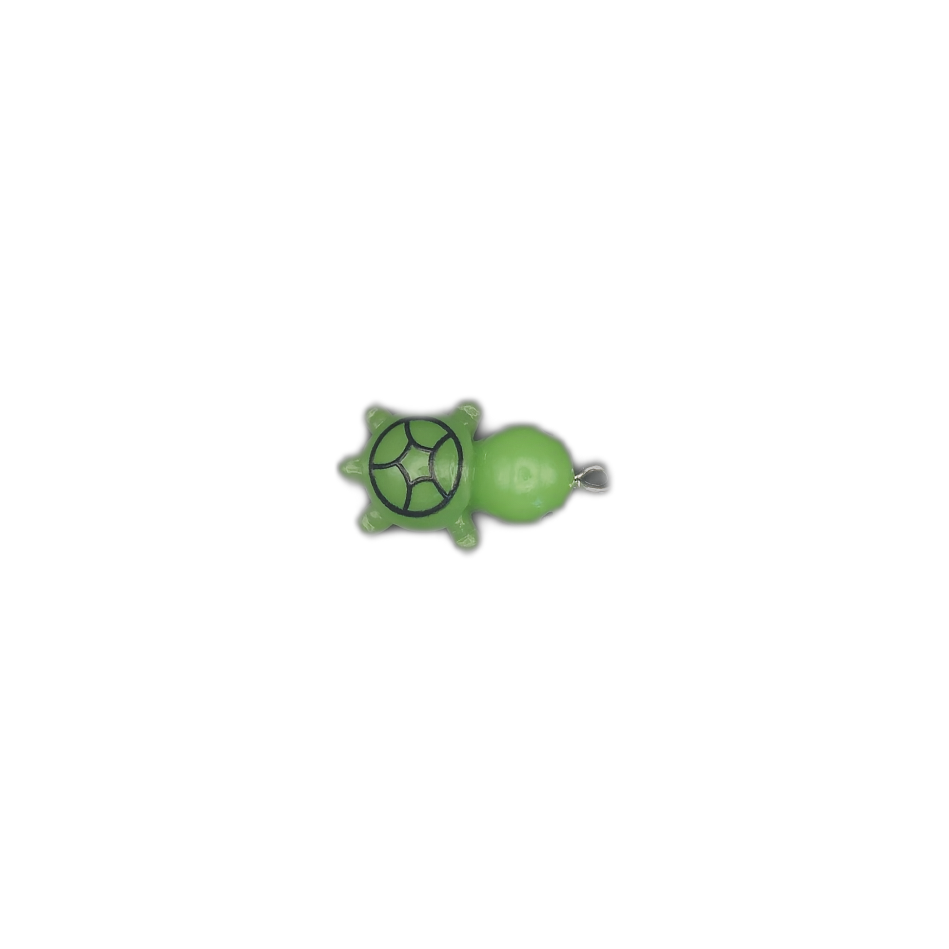 small green turtle charm centered on a black background